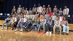 AAYA winners seated on stage, three rows.